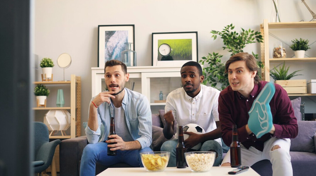 people watching tv together
